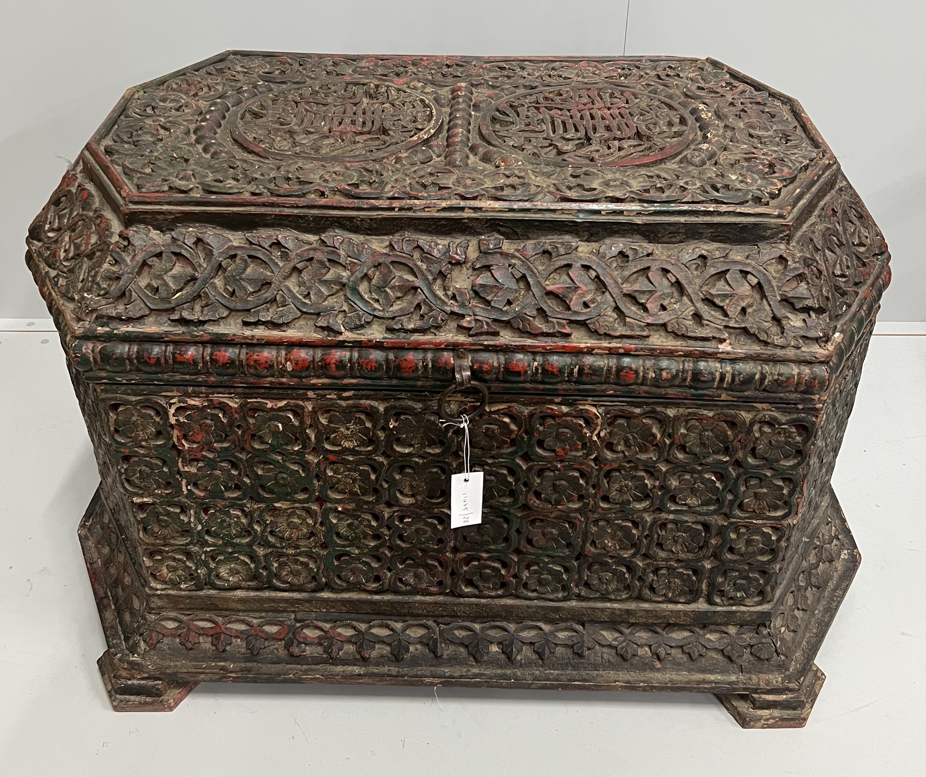 An Islamic octagonal carved wood trunk, width 116cm, depth 64cm, height 64cm, the cover carved “Abu Al-Nasr Qaitbay” (Glory Be to Our Master the Sultan)